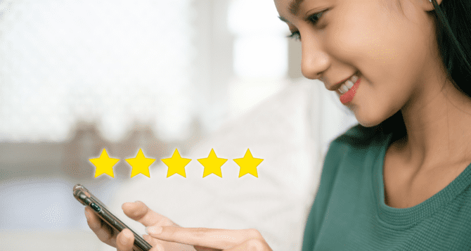 Woman making a reservation on her smartphone
