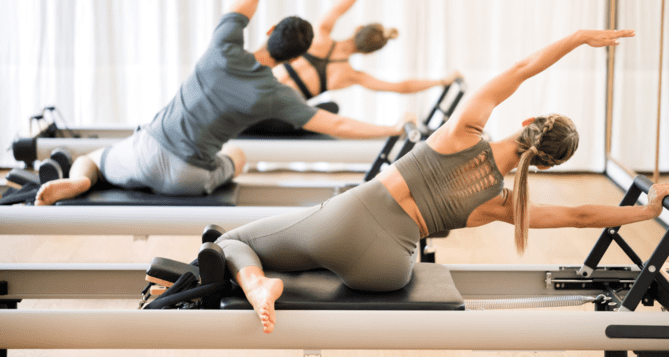 A woman and her friends doing machine pilates