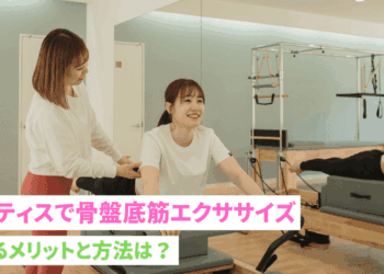 Woman and instructor happily doing pilates