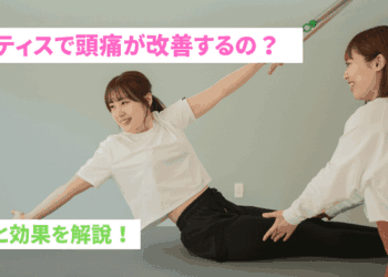 Smiling woman and instructor doing Pilates