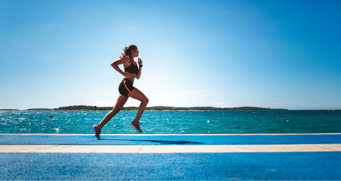 woman running on the beach